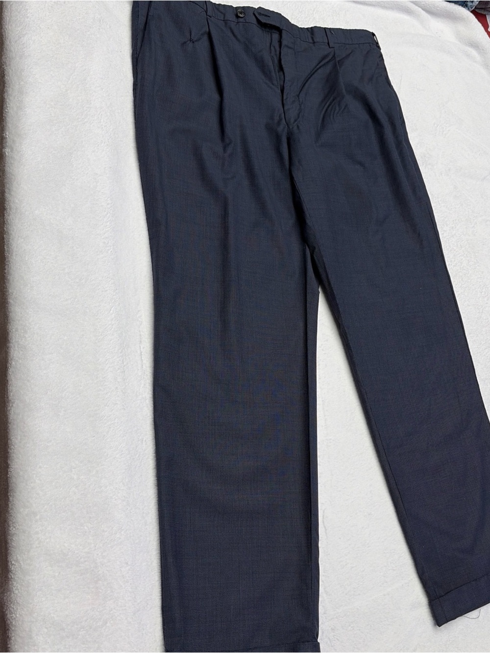 navy blue dress trousers by the classic American tailoring brand Hickey Freeman.